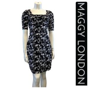 MAGGY LONDON black & white short sleeve layered tiered high end dress. Like new